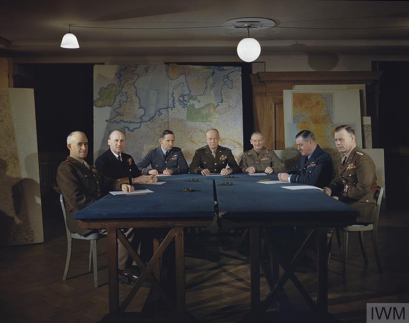 MEETING OF THE SUPREME COMMAND, ALLIED EXPEDITIONARY FORCE, LONDON, 1 FEBRUARY 1944 (TR 1541) Left to right: Lieutenant General Omar Bradley, Commander in Chief, 1st US Army; Admiral Sir Bertram H Ramsay, Allied Naval Commander in Chief, Expeditionary Force; Air Chief Marshal Sir Arthur W Tedder, Deputy Supreme Commander, Expeditionary Force; General Dwight D Eisenhower, Supreme Commander, Expeditionary Force; General Sir Bernard Montgomery, Commander in Chief 21st Army Group; Air Chief Ma... Copyright: © IWM. Original Source: http://www.iwm.org.uk/collections/item/object/205123947